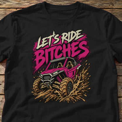 Let's Ride Bitches t-shirt in Black, laid flat on weathered wood