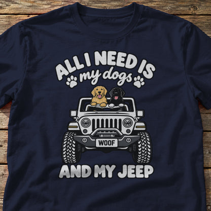 All I Need Is My Dogs and My 4x4 t-shirt in Navy, laid flat on weathered wood