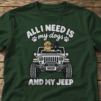 All I Need Is My Dogs and My 4x4 t-shirt in Forest Green, laid flat on weathered wood