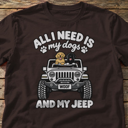 All I Need Is My Dogs and My 4x4 t-shirt in Dark Chocolate, laid flat on weathered wood