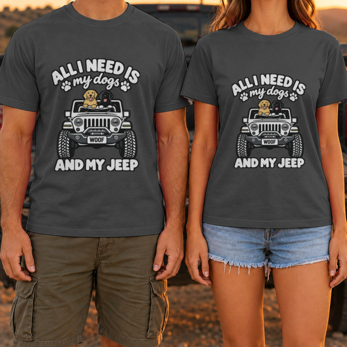 All I Need Is My Dogs and My 4x4 t-shirt in Dark Heather, worn by a couple at a truck tailgate